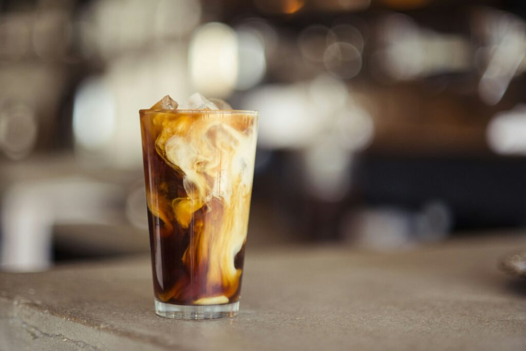 A cold iced coffee, a Boston summer staple that is safe to enjoy