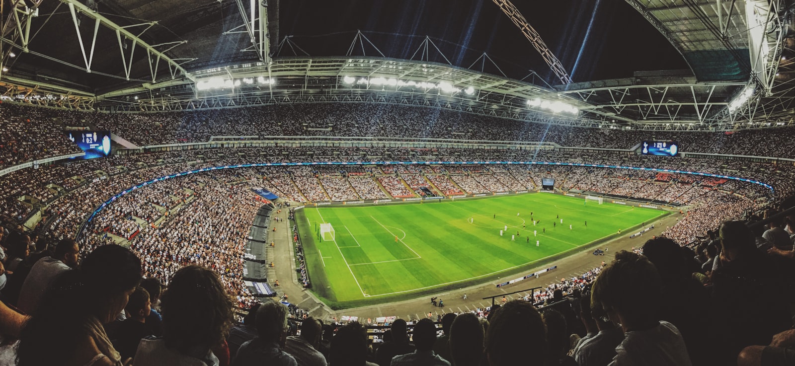 Soccer fans filling a stadium during a FIFA World Cup 2026 match