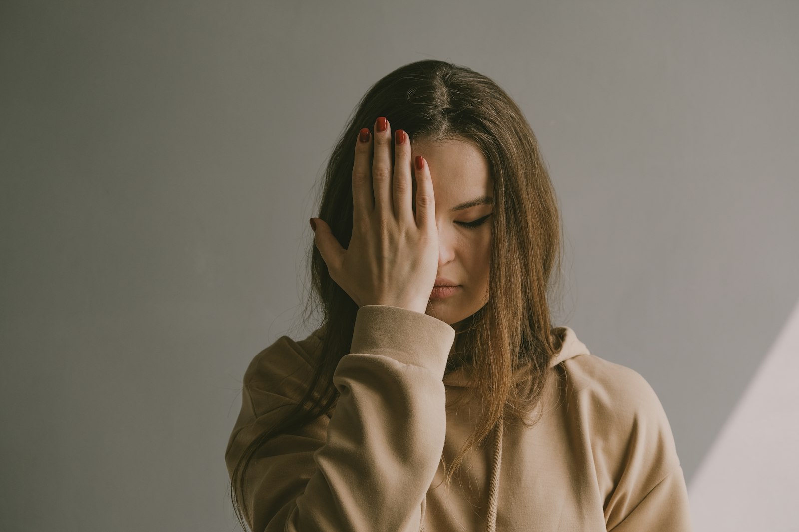 Person feeling anxious before a dental appointment in Belmont MA