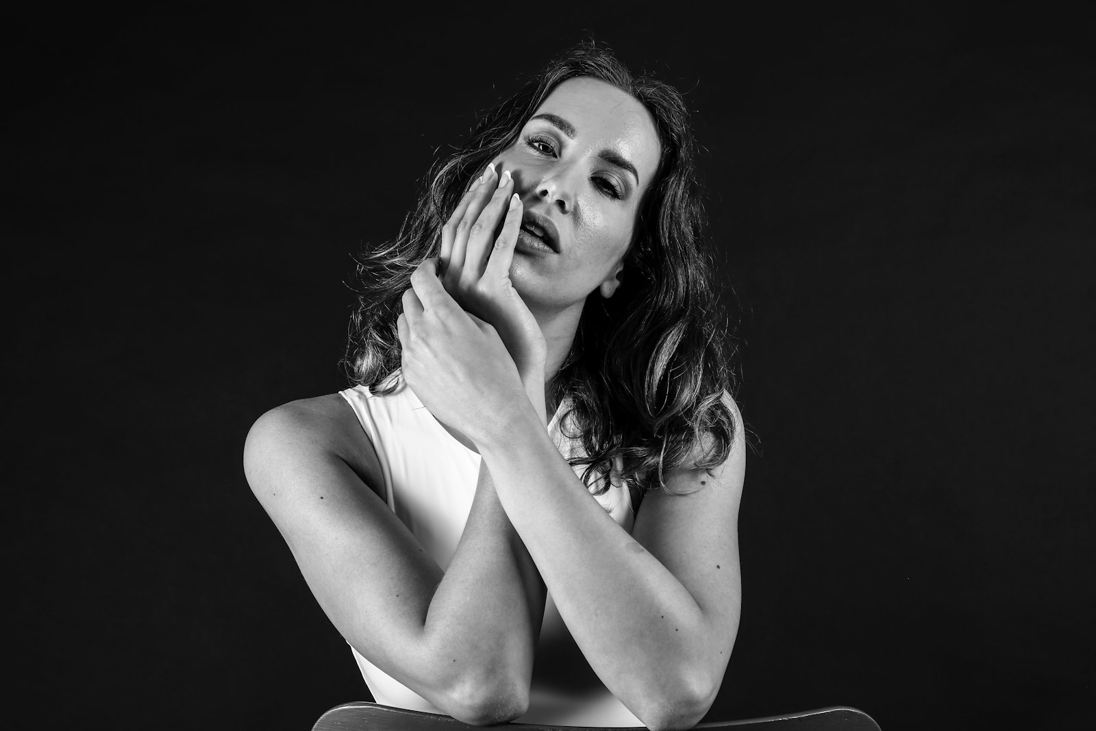 Person experiencing jaw pain from a TMJ disorder in Belmont MA