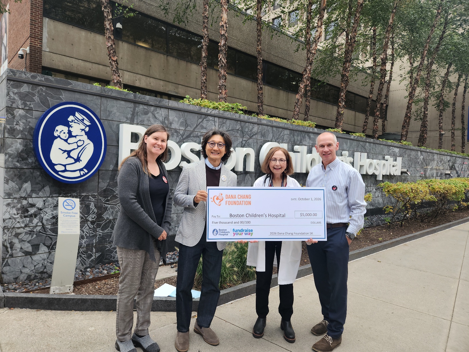 Dana Chang Foundation presents a $5,000 check to Boston Children's Hospital at the 2026 Dana Chang Foundation 5K